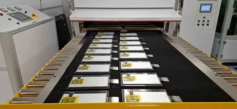 Electronic components on a production transport line